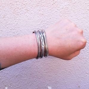 VINTAGE SILVER TRIO OF DECORATED CUFF BRACELETS